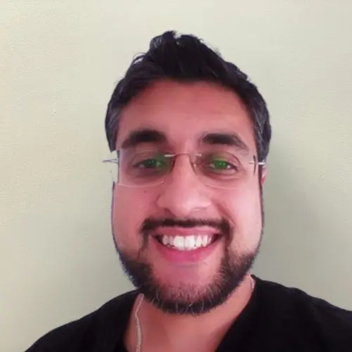 Dr Uzman Ul-Haq, visiting implant dentist at Allen House Dental in Crewe